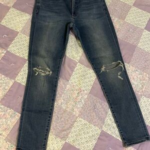 Women's Distressed Blue Jeans